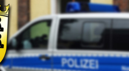 Polizei - Wappen und Polizeifahrzeug